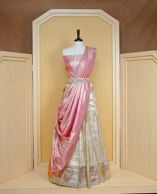 Light gold & Light pink Semi Stitched Dhavani Set Light Gold Skirt With Peacock Pattern With Stone Worked Border, Paired with Unstitched Blouse, Elegant Dupatta For Prefect look.