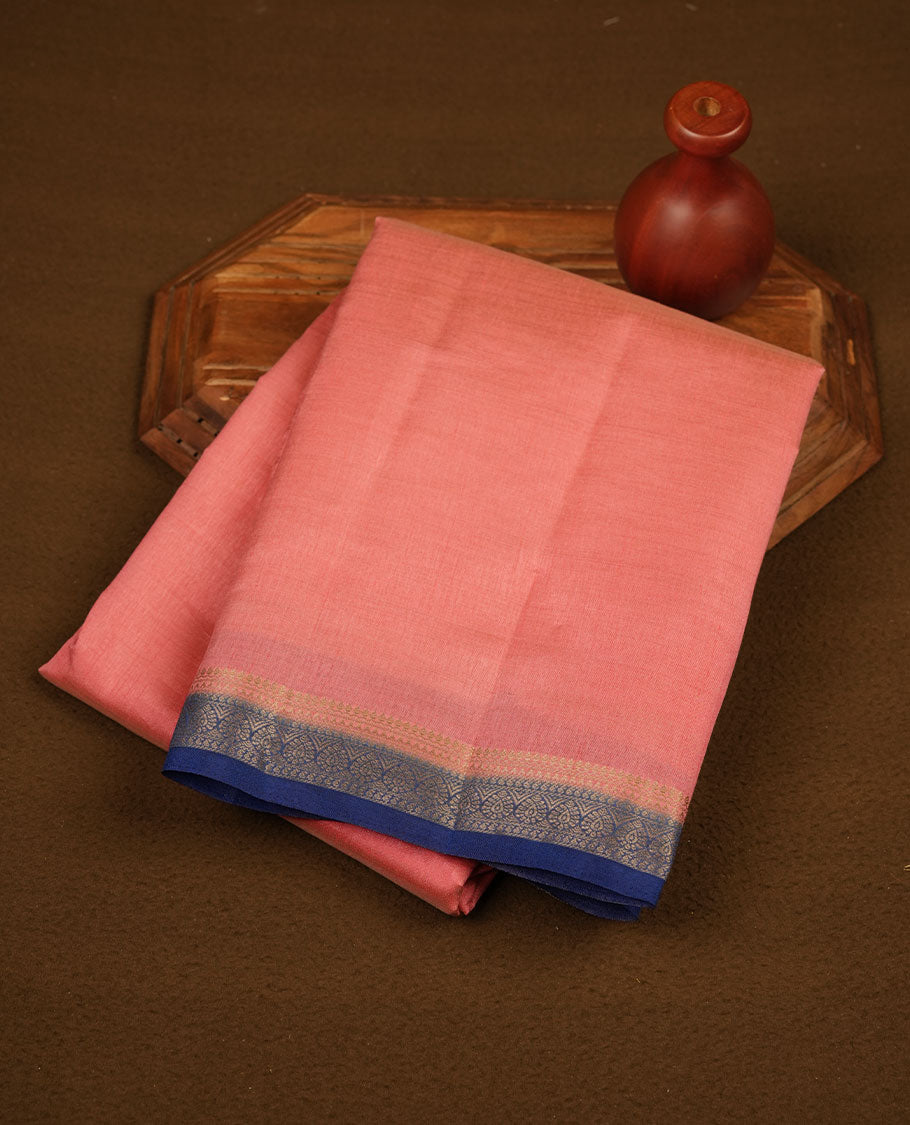 Pink colour semi tussar saree featuring elegant plain body, contrast Blue colour gold zari border and comes with matching blouse piece.
