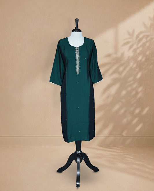 Peacock Green Kurti featuring a plain solid body with delicate scattered silver butti embroidery, a wide round neckline Adorned With Stone  & Bead work , 3/4 Sleeve Design.