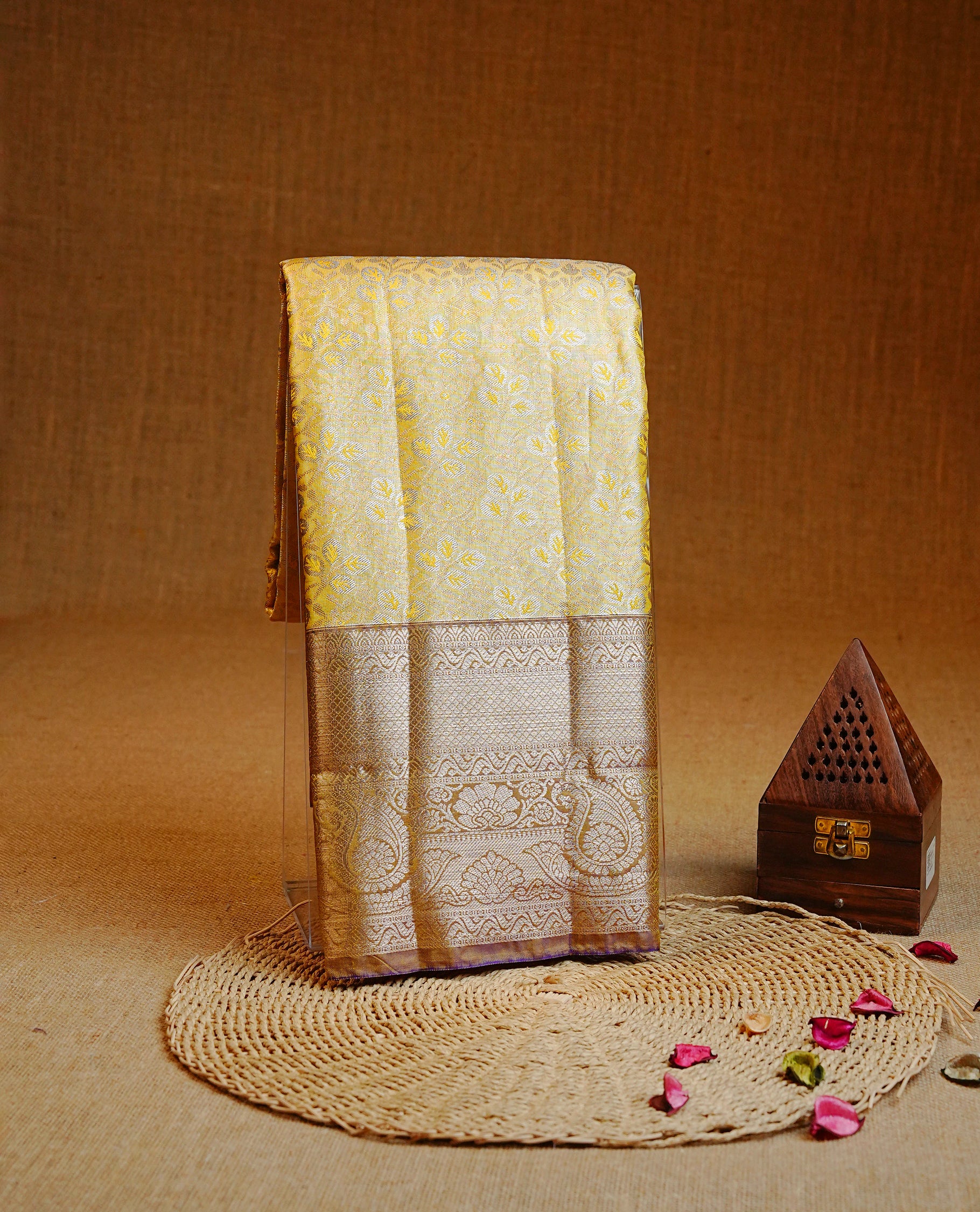Pale Yellow colour Double shade Semi tissue silk saree featuring Gold & silver zari kodi pattern on body, contrast Olive colour with traditional border, Violet colour with silver zari Pallu, paired with matching.