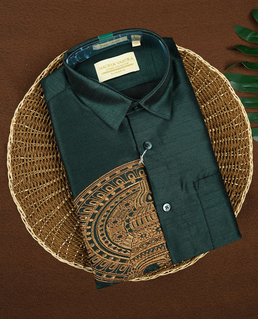 Olive green colour semi silk shirt featuring an exquisite golden Kathakali face fancy print on the chest, styled with a classic collar, full sleeves, and chest pocket, perfect for festive and traditional occasions.