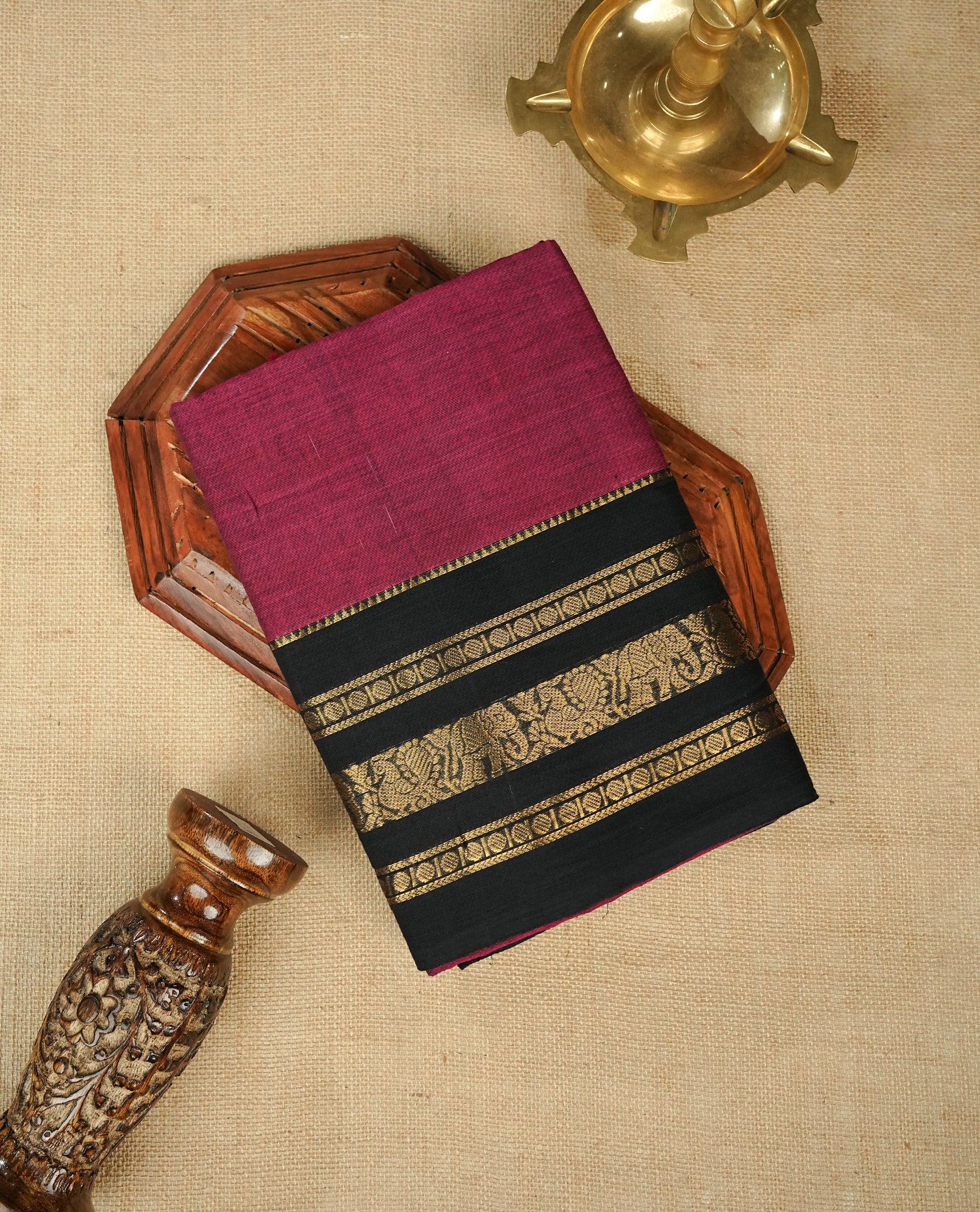 Magenta Colour Chettinad Cotton Saree Featuring a Plain Body, Complemented by a Contrast Black Colour Border with Elephant & Peacock Gold Zari Border & Contrast Striped Pallu, Paired with a Matching Blouse Piece.