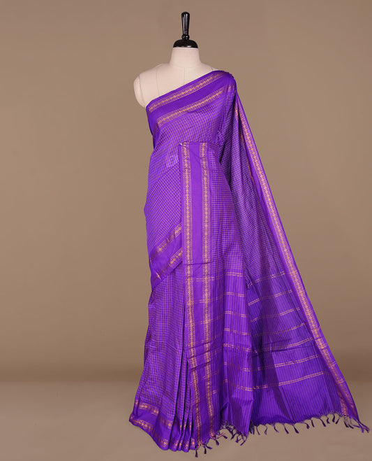 Indigo colour kalyani cotton saree featuring check pattern on body, complemented by self colour with traditional border, paired with matching blouse piece.