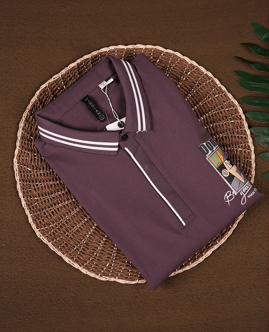 Concord grape colour T shirt featuring a graphic print on left side , classic shirt colour and short sleeves, for a casual, stylish look.