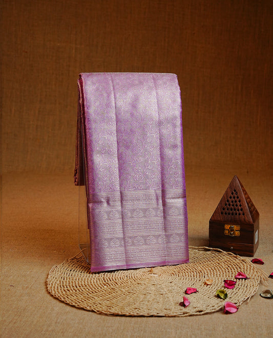 Lavender & Gold colour Double shade Semi tissue silk saree featuring self color kodi pattern on body, self colour with traditional border, paired with matching.