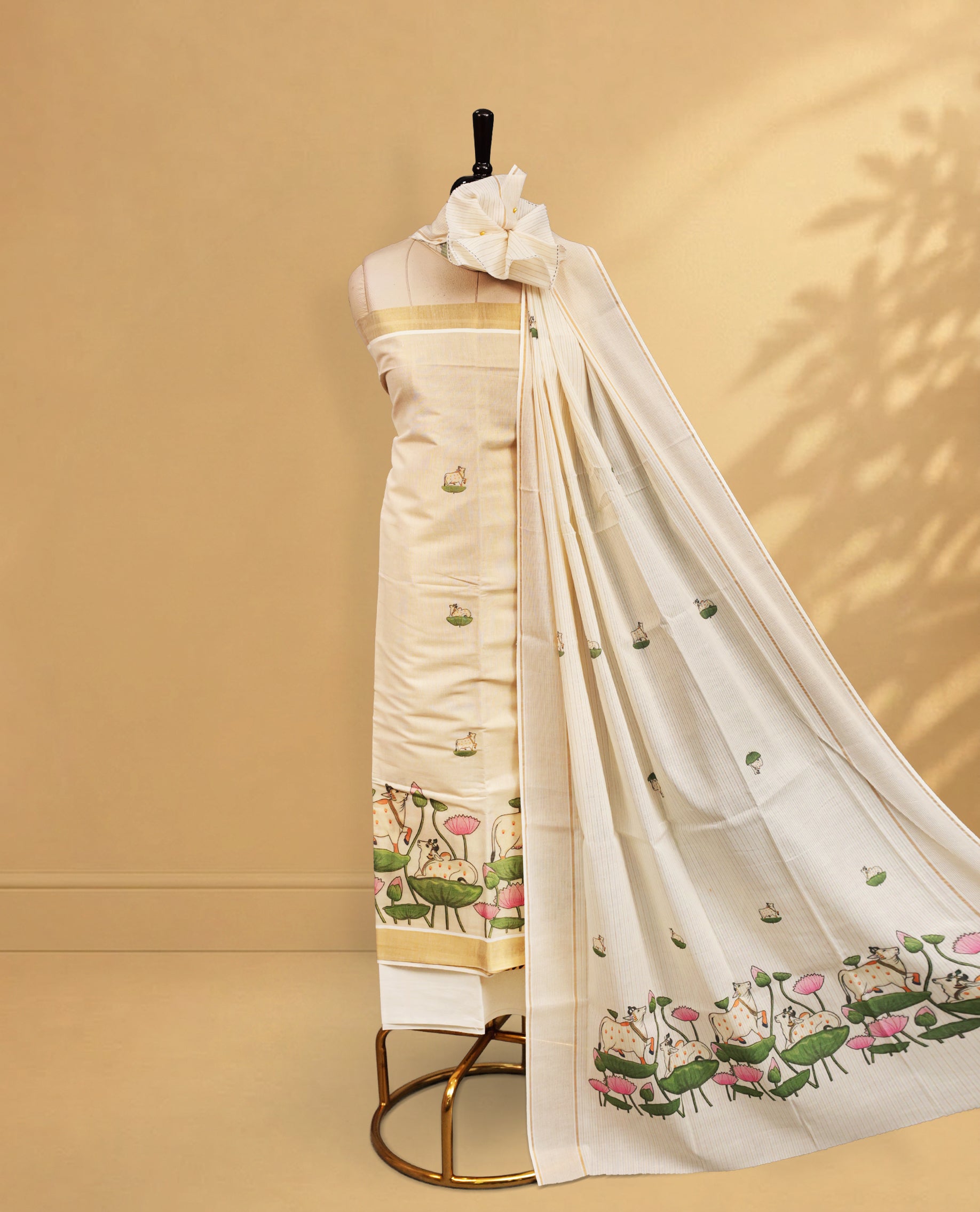 Cream Colour Tissue Salwar Material Featuring Lotus Print on body, paired with matching Bottom & Elegant Dupatta.