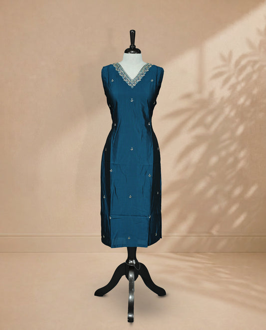 Peacock Blue  Colour Kurti featuring beadwork across the body, a V-shaped neckline adorned with bead and mirror work and a sleeveless design.