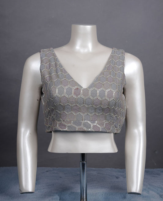 Grey colour padded blouse with gold hexagon weave, sleeveless V-neck, and deep V-back with tie-up tassels.