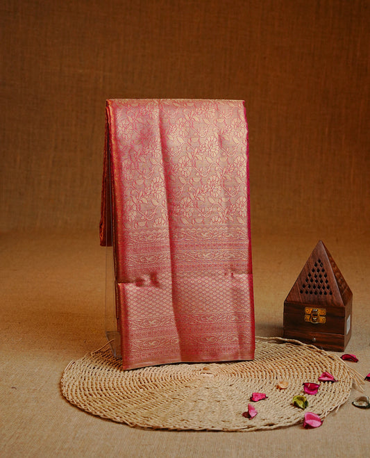 Magenta & Gold colour Double shade Semi tissue silk saree featuring Gold zari kodi pattern on body, self colour with traditional border, paired with matching.