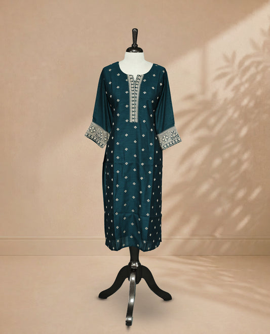 Teal colored Kurti featuring cream colored threadwork on the body, a round neckline adorned with intricate thread detailing, and 3/4 sleeves.