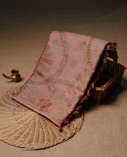 Peach colour pure tussar silk saree featuring elegant antique zari kodi patterns across the body, designed with a graceful borderless finish for a refined look. Paired with a matching blouse piece.