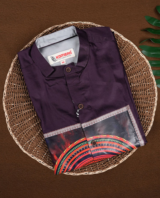Deep purple men’s shirt crafted in a smooth finish, featuring a mandarin collar, full sleeves, and a striking multicolour traditional printed panel on the front, ideal for festive and cultural occasions.