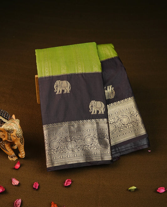 Pista green colour semi wedding silk saree featuring gold zari stripes on body, contrast dark chocolate colour with traditional border on body, rich pallu comes with matching blouse piece