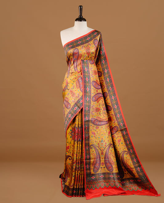 Mustard yellow colour Pashmina Saree featuring multicolour floral and paisley woven body, a contrast multicolour geometric border with red edging, an ornate paisley woven pallu, paired with a matching blouse.