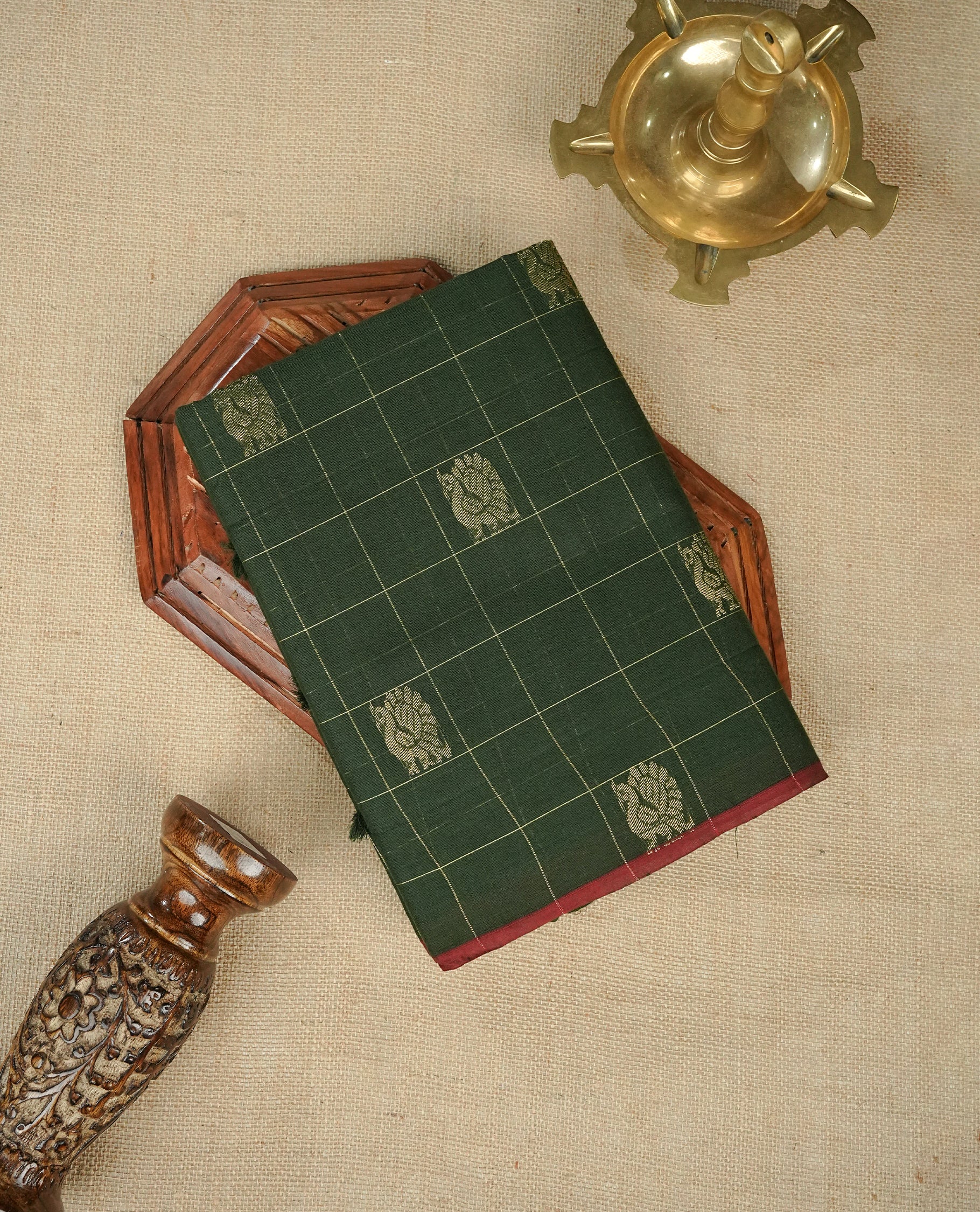 Dark Green Colour Chettinad Cotton Saree Featuring Gold Zari Checks with Peacock Motifs on the Body, Complemented by a Minimal Maroon Border and a Grand Gold Zari Pallu, Paired with a Matching Blouse Piece.