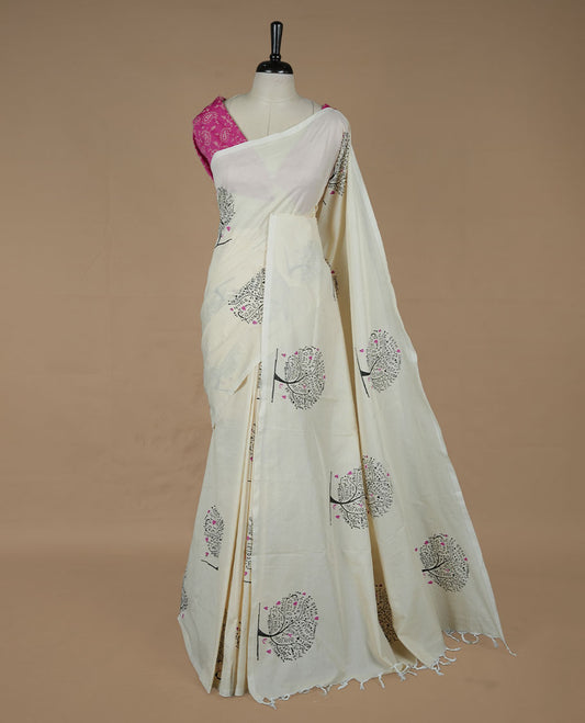 Cream colour poly cotton saree featuring Family tree printed body, without border, comes with Double blouse option and running blouse piece