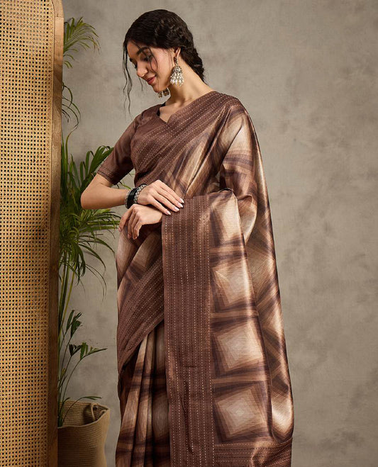 Brown toned semi Tussar saree featuring contemporary fancy prints across the body, enhanced with a subtle Katha style stitched border, paired with a matching blouse for a stylish and elegant ethnic look.