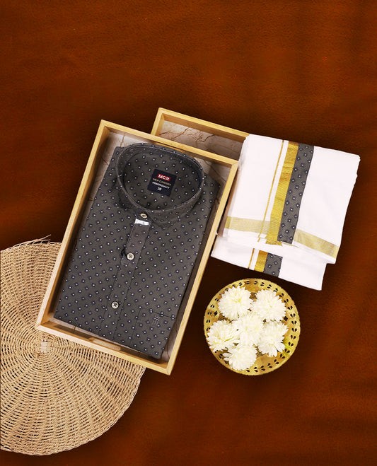 Dark grey colour MCR printed shirt featuring subtle all over motifs, paired with a white dhoti highlighted with an elegant golden zari kara and a matching dark grey printed border.