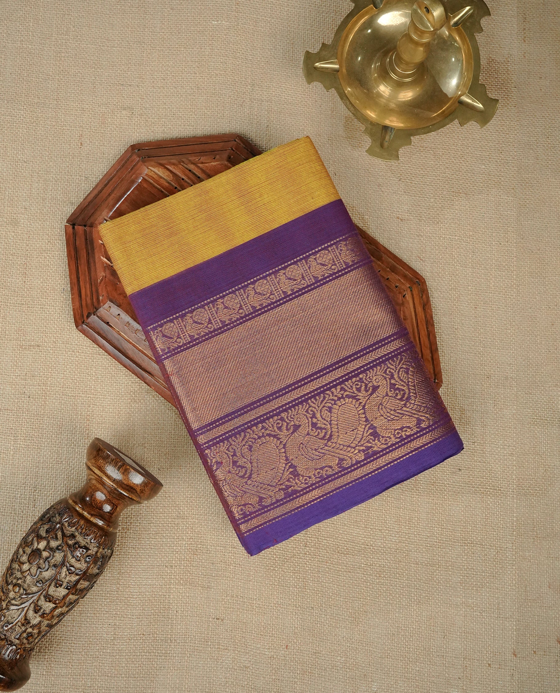 Lemon green  colour chettinad cotton saree featuring Elegant plain body, Contrast Violet colour with Gold zari border, comes with matching blouse piece.