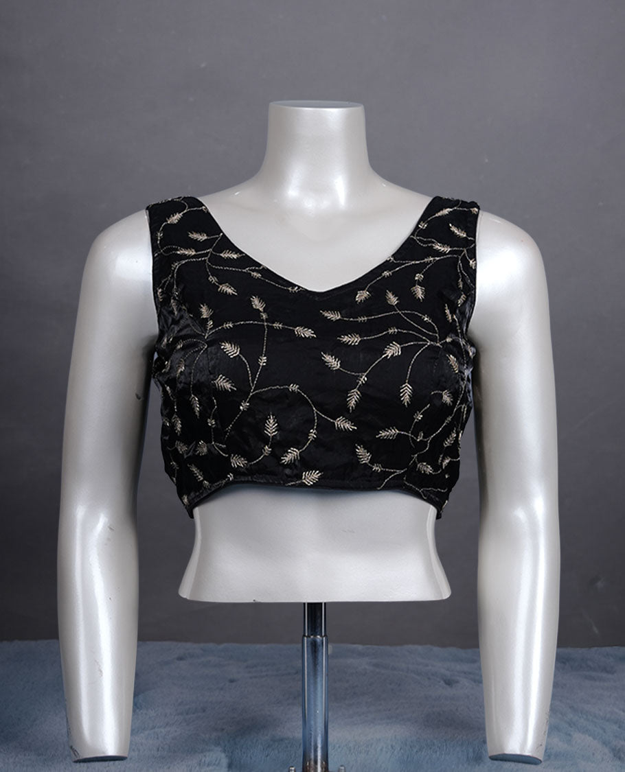 Black embroidered padded blouse with gold vine detailing, V neckline, and tie-back finish.