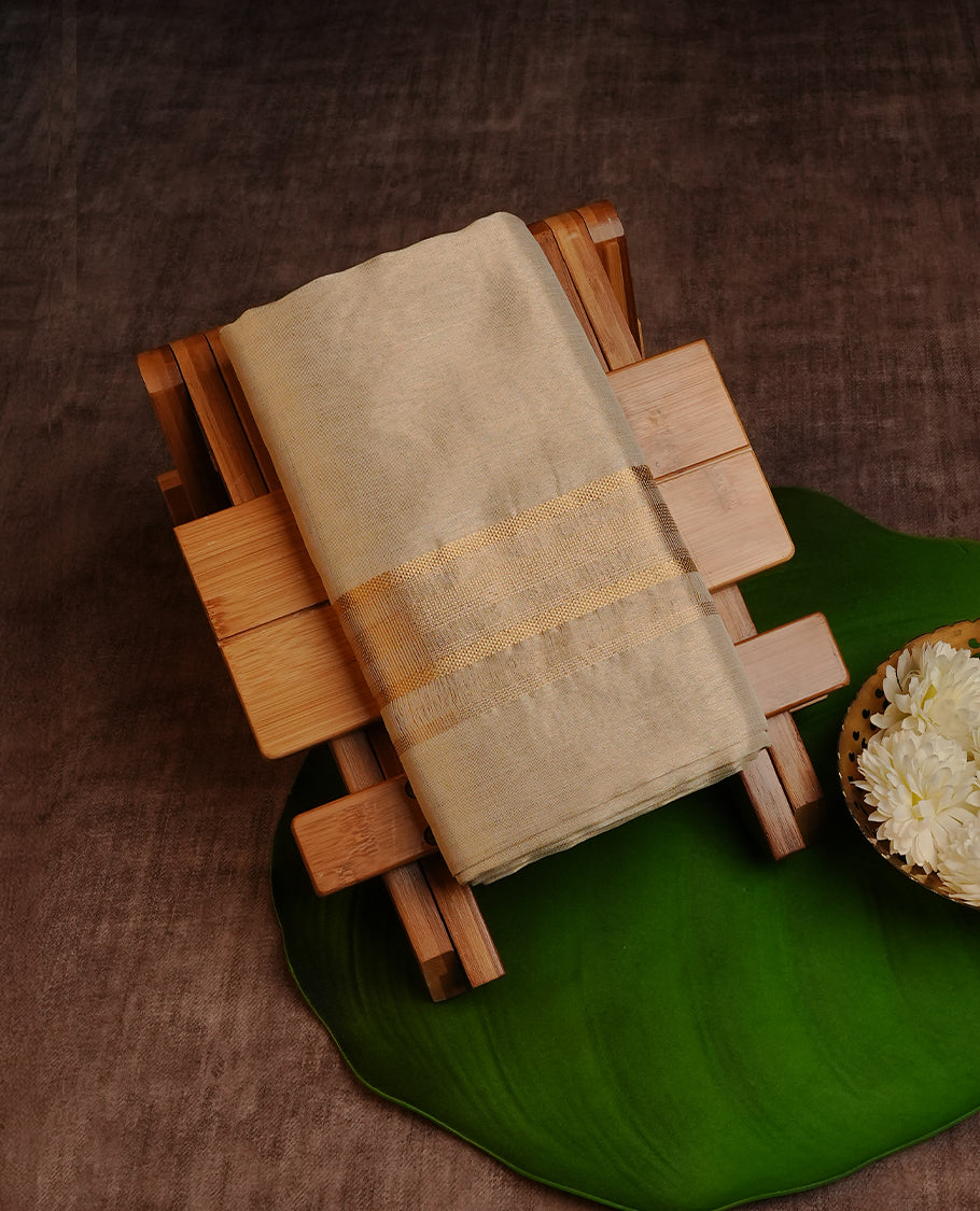 Gold colour pure Tissue double dhoti featuring Plain with Gold zari Border.