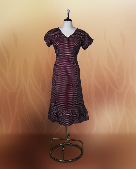 Brown colour nightwear with tiny off white colour polka dots, V neckline, and flutter sleeves & The flared hem with pleats adds a chic touch, Ideal for casual wear, office looks, or relaxed outings with a stylish twist.