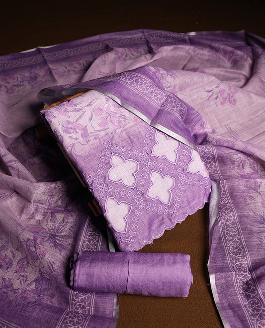 Lavender colour churidhar material featuring floral and cutwork embroidery on the front panel, digital floral printed dupatta with elegant border, and matching plain bottom.