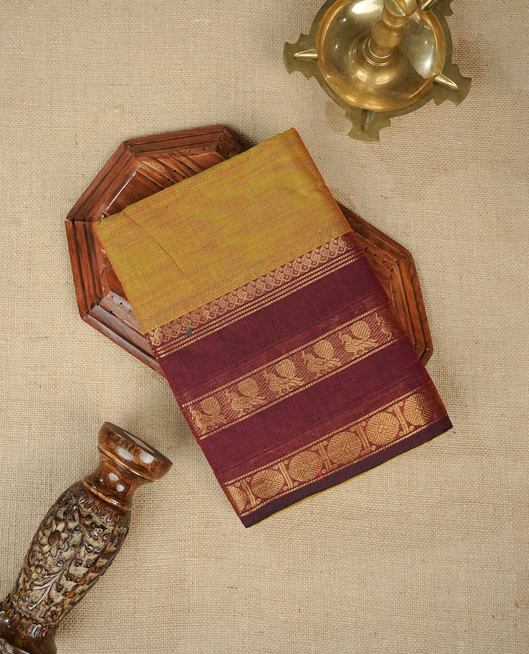 Olive Colour Chettinad Cotton Saree Featuring a Plain Body, Complemented by a Maroon Colour Border with Gold Zari and a Contrast Striped Pallu, Paired with a Matching Blouse Piece.