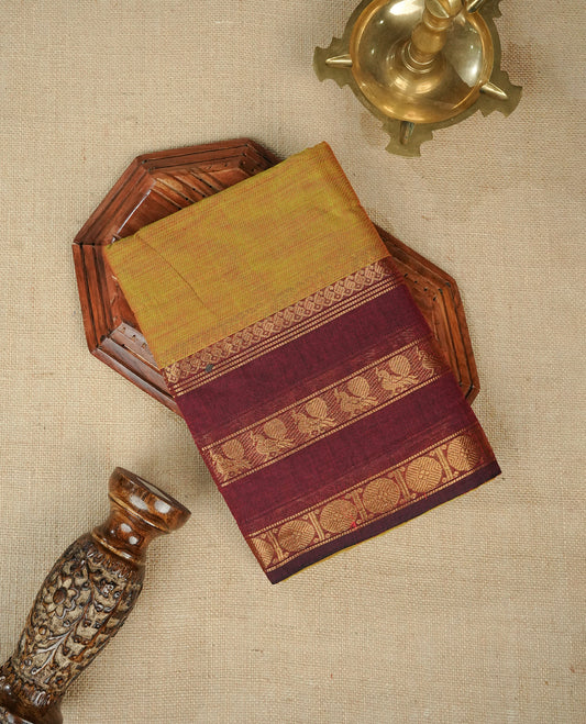 Olive Colour Chettinad Cotton Saree Featuring a Plain Body, Complemented by a Maroon Colour Border with Gold Zari and a Contrast Striped Pallu, Paired with a Matching Blouse Piece.