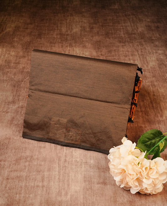 Dark Brown colour Polycotton Saree featuring elegant Circle ajrakh designs on the body, complemented by a matching pallu & Paired with a contrasting printed blouse piece