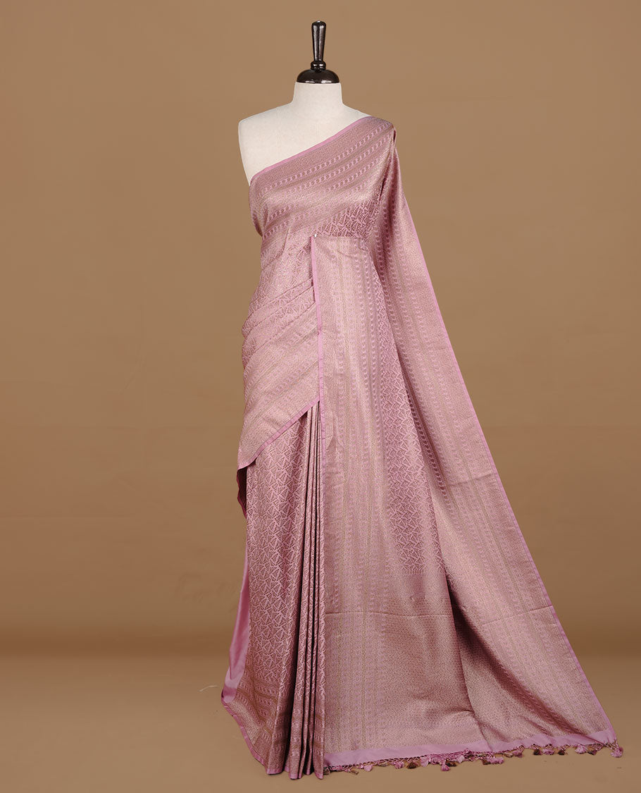 Pink colour Semi Banaras Katan saree featuring Antique zari Floral pattern on body, complemented by self colour zari border, paired with matching blouse piece.