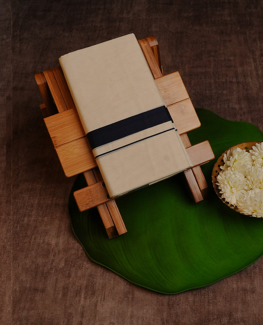 Cream Colour Cotton Double Dhoti Finished With A Classic Body , A Navy Blue Kara