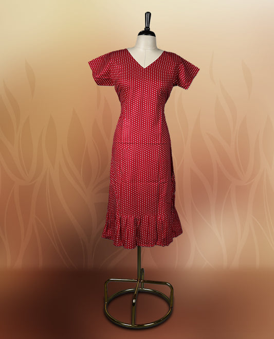 Red colour nightwear with tiny off white colour circles, V neckline, and flutter sleeves & The flared hem with pleats adds a chic touch, Ideal for casual wear, office looks, or relaxed outings with a stylish twist.