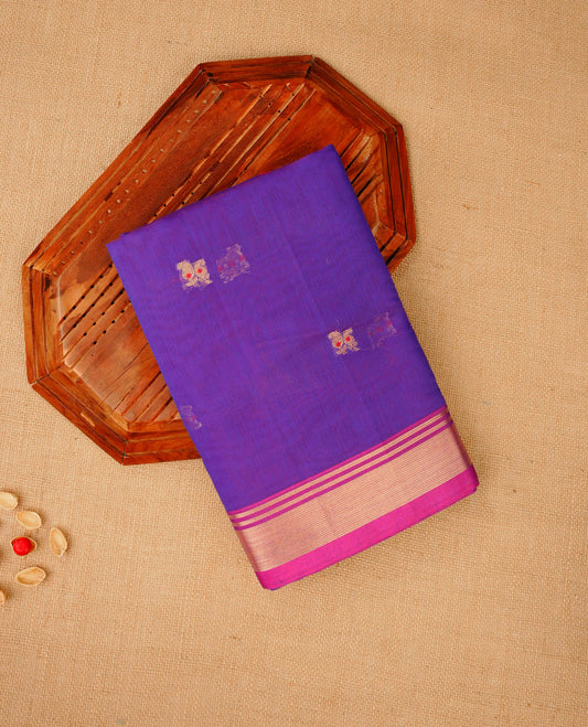 Rich purple colour Maheshwari cotton saree, gold zari floral motifs on body, complement magenta colour gold zari border comes with matching blouse.