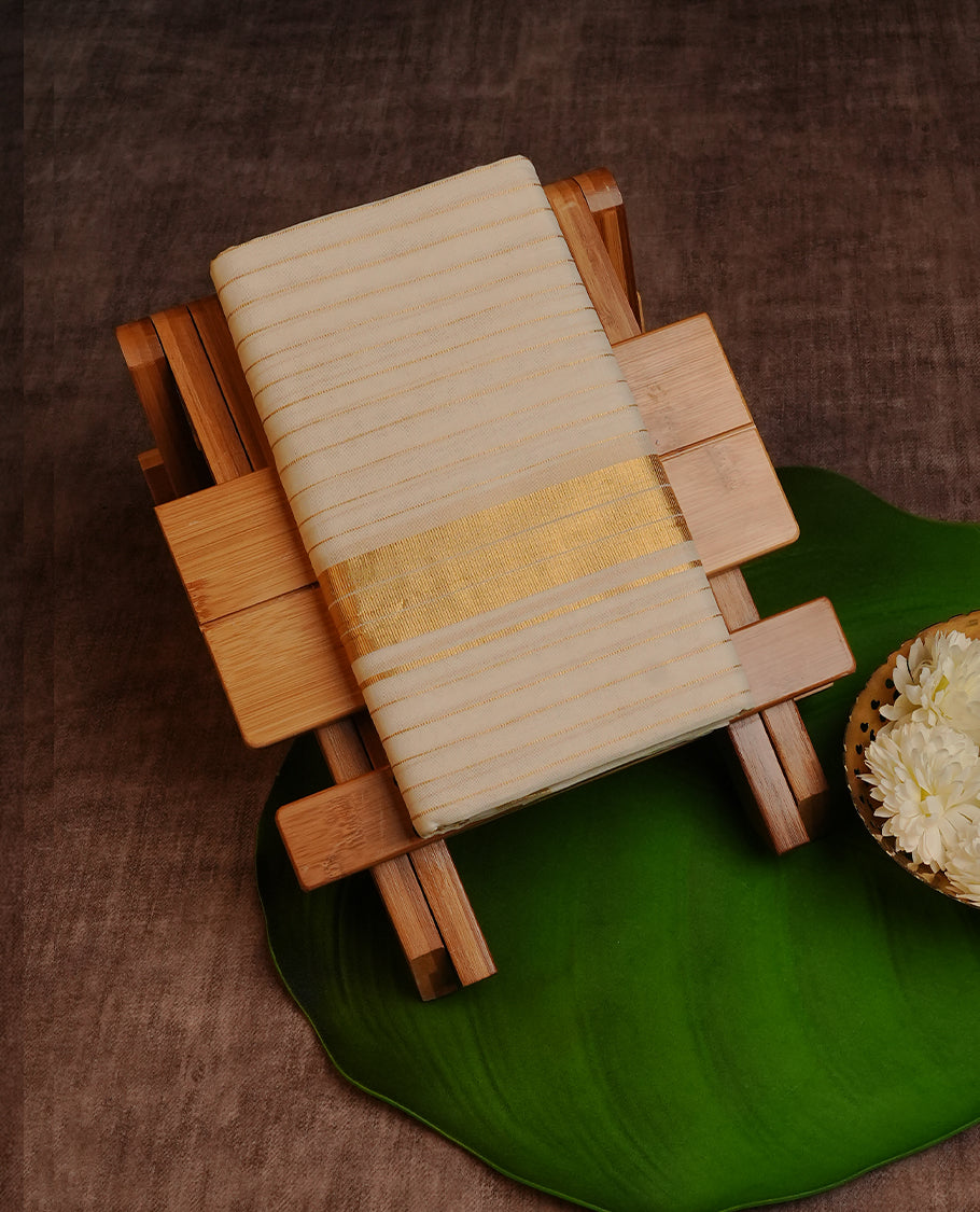 Cream  Colour  Pure Cotton Double Dhoti Featuring Elegant  Stripes Across The Body With A Classic Gold  Kasav Kara