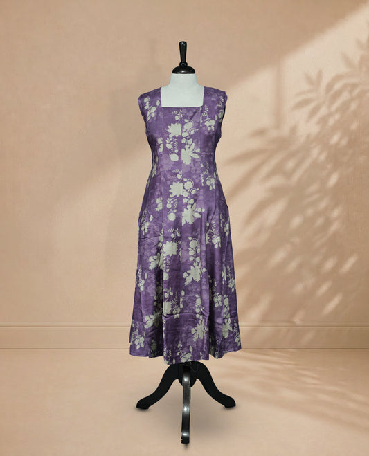 Purple Colour Kurti featuring Light Brown Colour Floral Prints on the body, a square neckline with a clean fitted yoke, sleeveless design