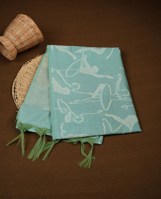 Pastel green colour semi tussar silk saree, featuring an intricate white dancing women motif on the body and pallu with gold zari , comes with matching blouse.