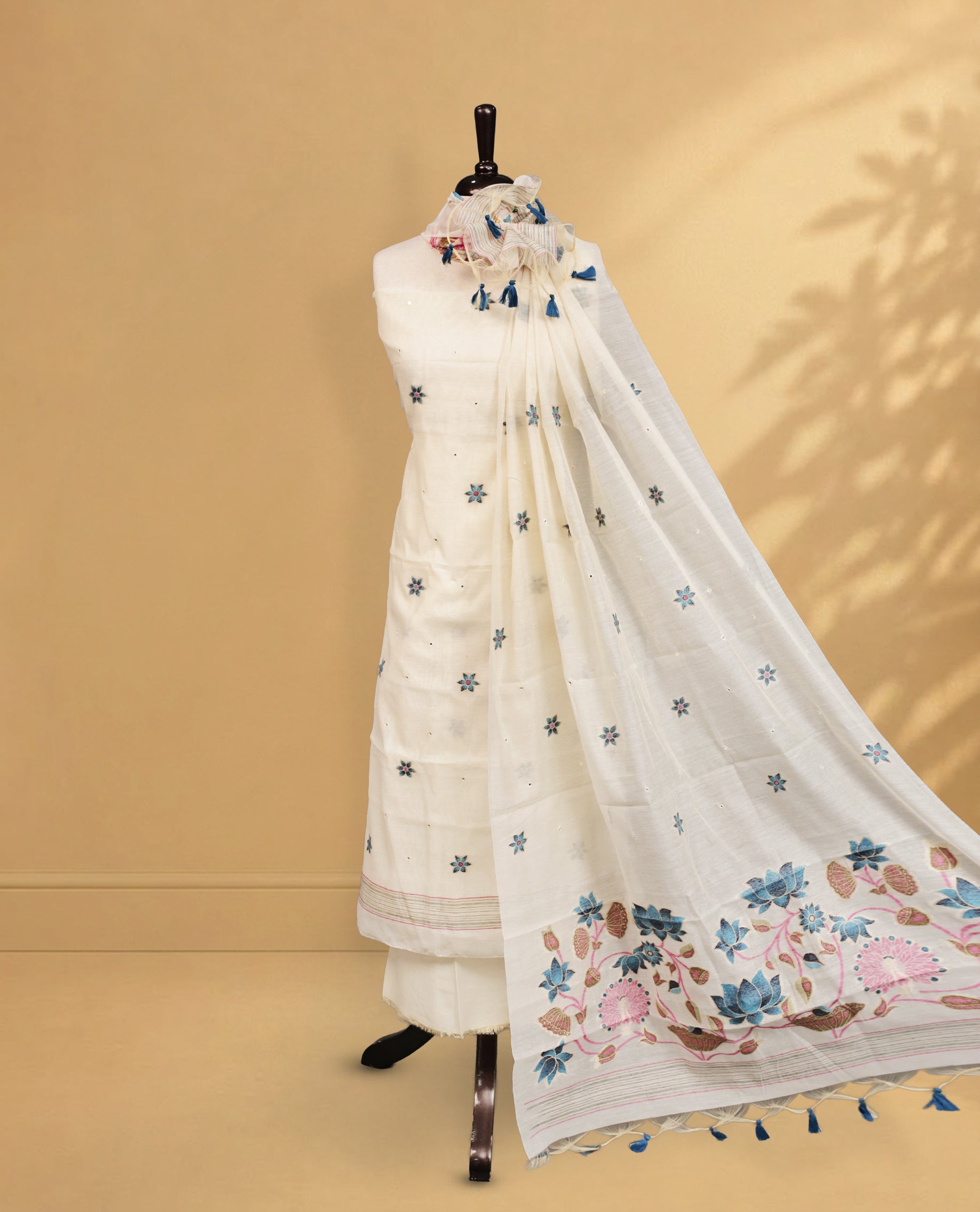 Cream colour salwar material Featuring Blue Colour Floral motifs on body, paired with matching bottom & Elegant Dupatta