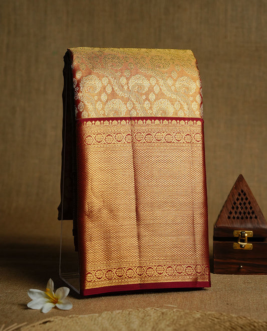 Gold & Maroon double shade colour  kancheepuram tissue silk saree featuring gold zari floral kodi pattern on body, complemented by contrast maroon colour with traditional border, paired with matching blouse piece.