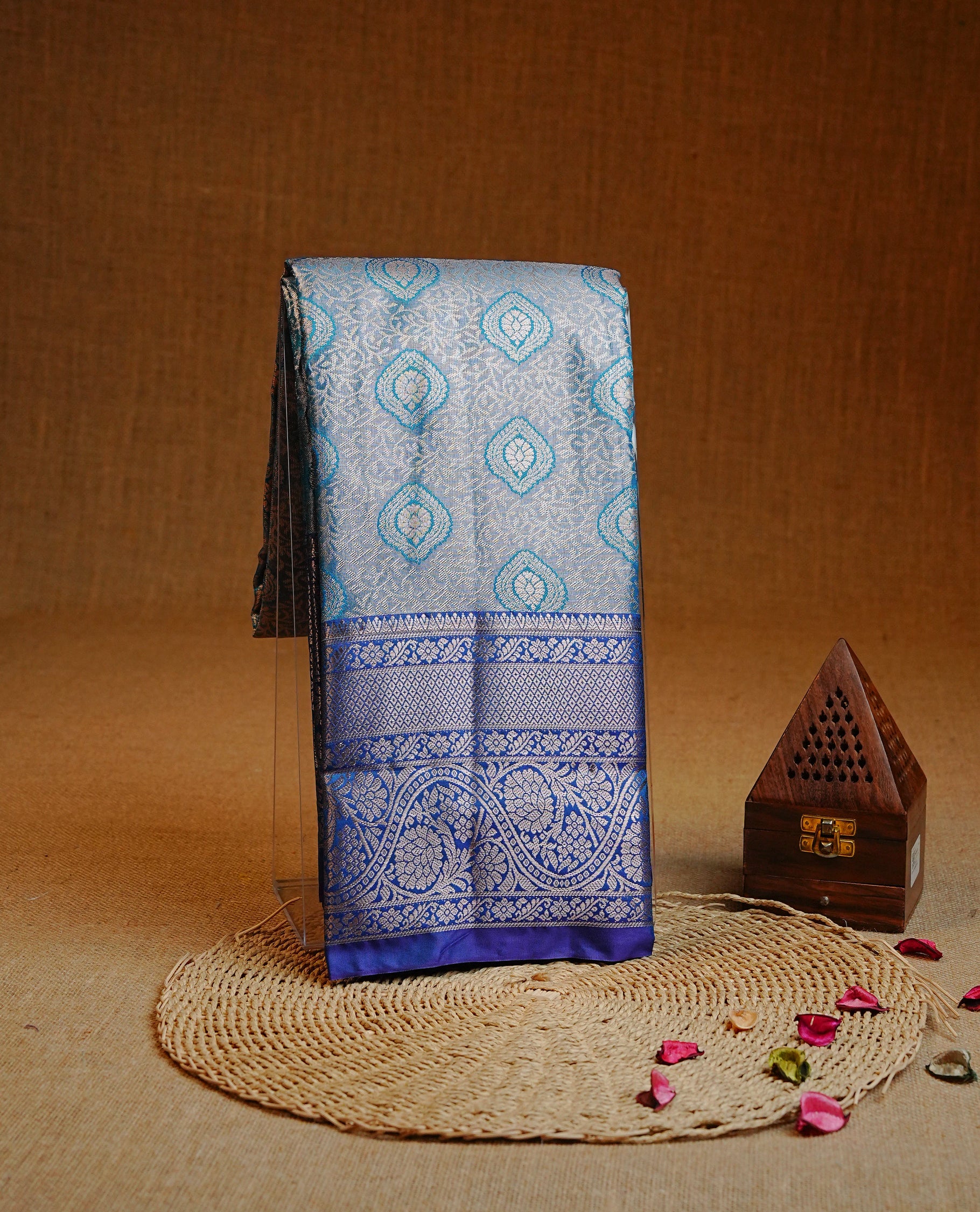 Light blue & Silver colour Double shade Semi tissue silk saree featuring Silver zari Kodi pattern on body, Contrast Blue colour with traditional border, paired with matching.