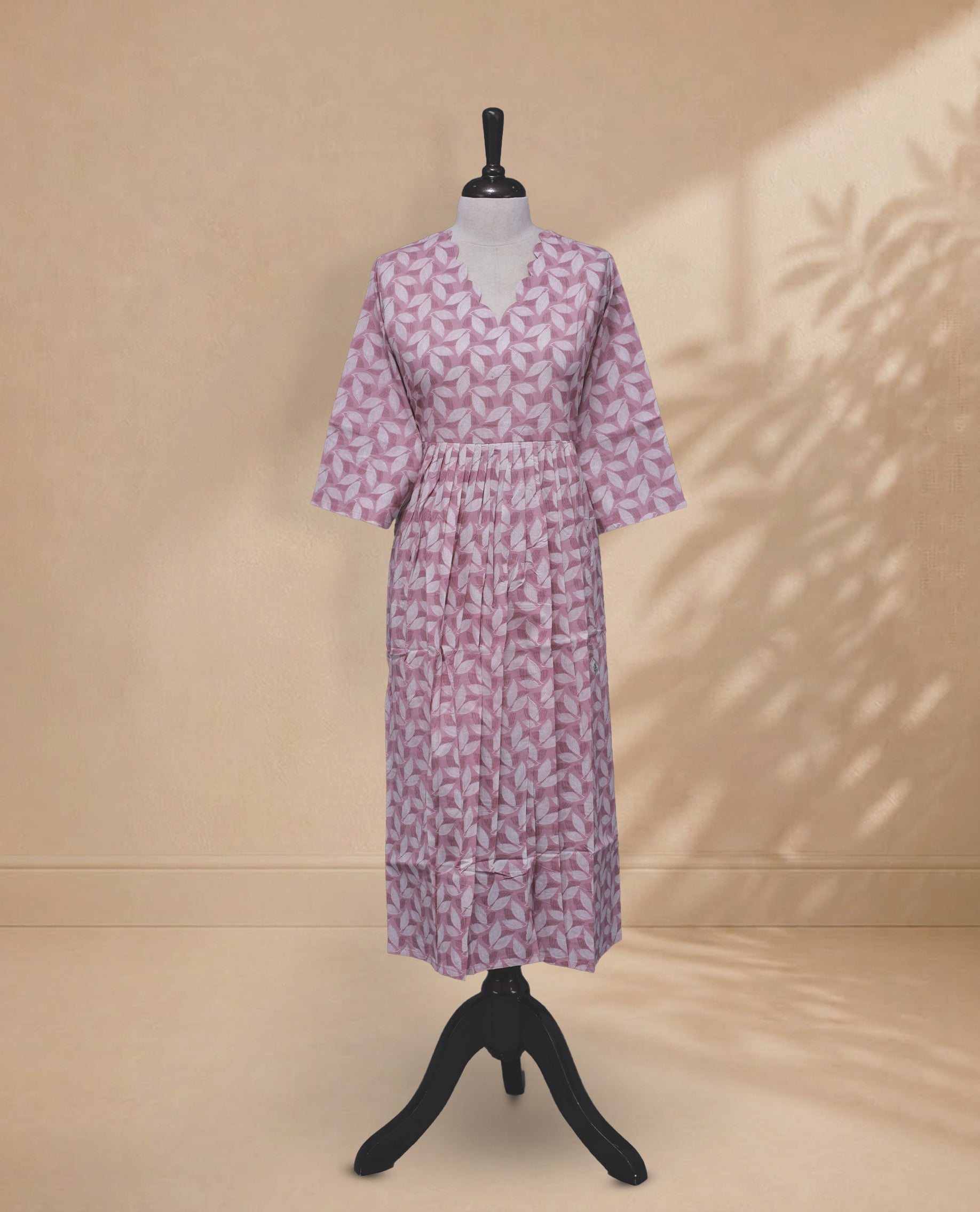 Light Pink Colour Kurti With An Elegant White Leaf Prints All Over The Body , Comes With Sleeve