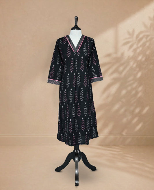 Black Kurti featuring pink and cream prints across the body, a V-shaped neckline with thread detailing, and 3/4 sleeves with a matching design.
