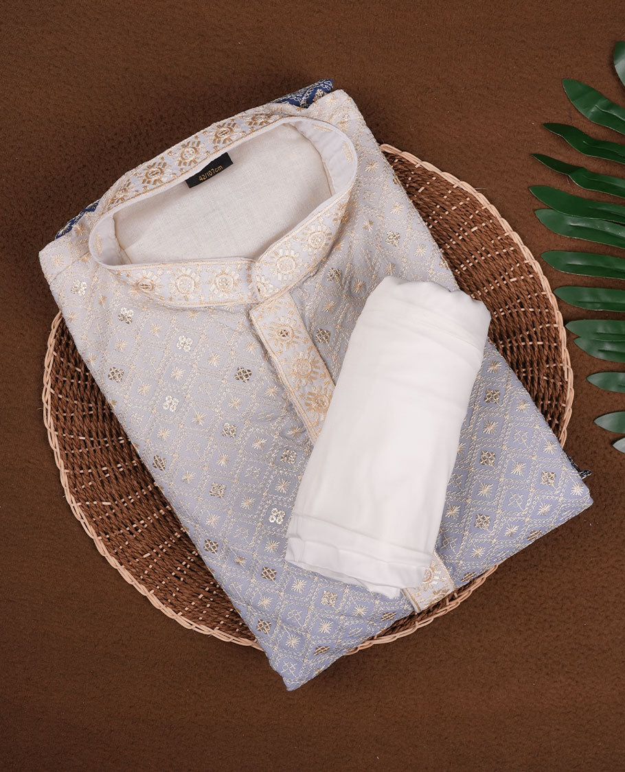 Powder blue semi silk kurta set with all over woven geometric floral motifs, mandarin collar with embroidered placket, and paired with a matching white bottom.