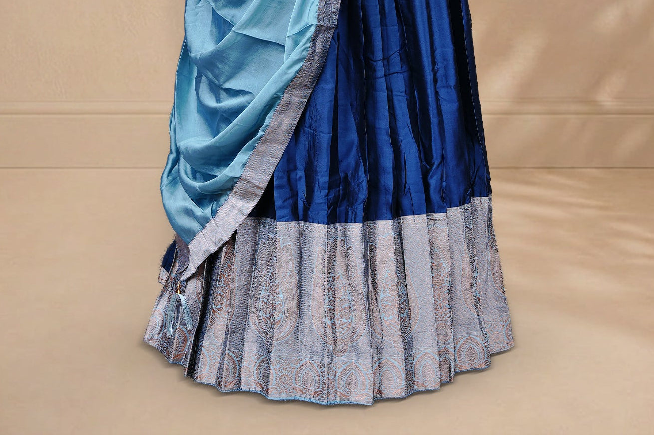 Teal Blue colour Half saree featuring Plain skirt with Zari border on contrast Aqua colour border, Unstitched Blouse and matching dupatta.
