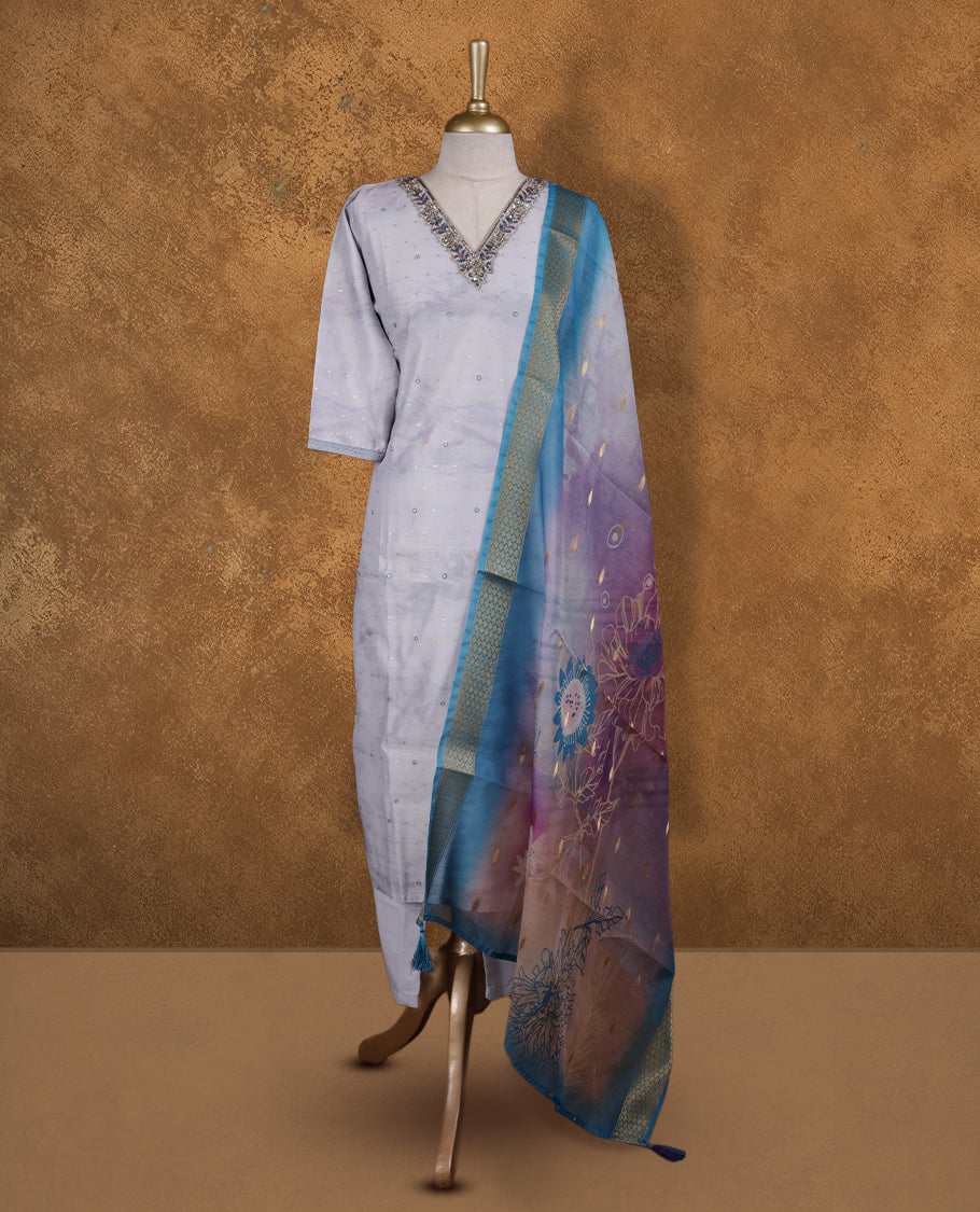 Light Lavender colour churidar set featuring thread and cut beats embroidered neckline, sleeves, and Gold colour motifs on body , Paired with a matching dupatta