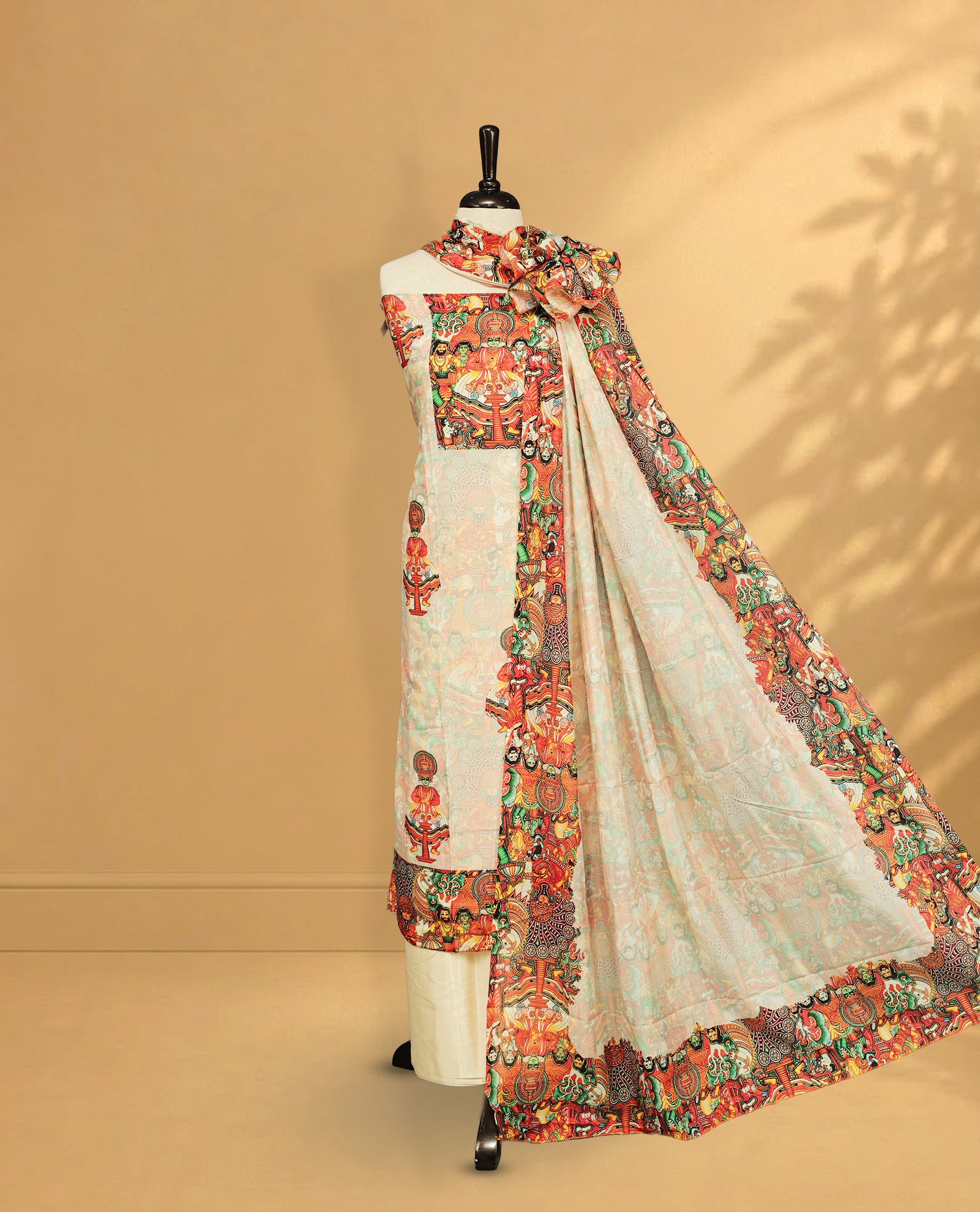 Cream colour salwar material Featuring Indian Art forms Print on body, paired with matching bottom & Elegant Dupatta.