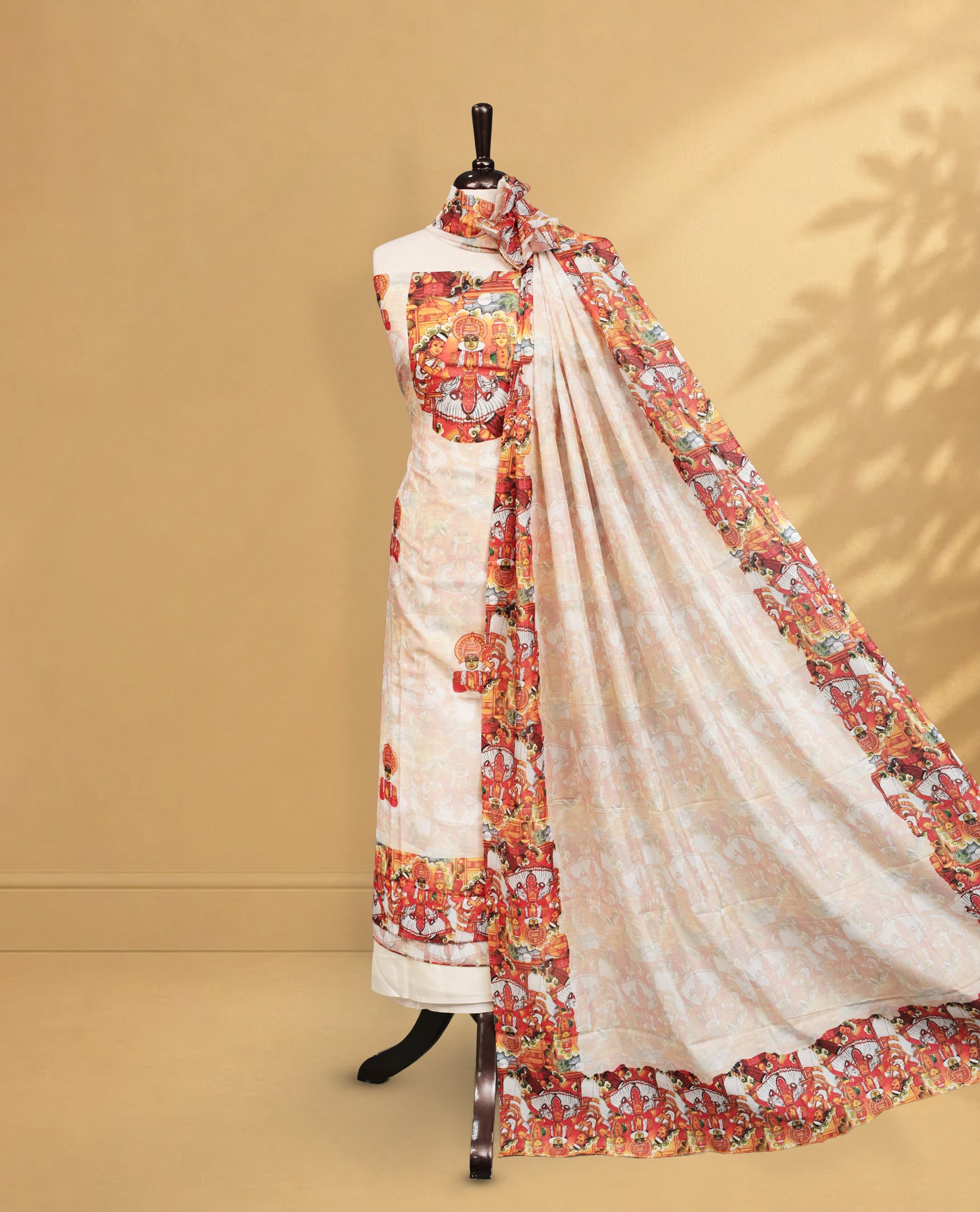 Cream colour salwar material Featuring Indian Art forms Print on body, paired with matching bottom & Elegant Dupatta