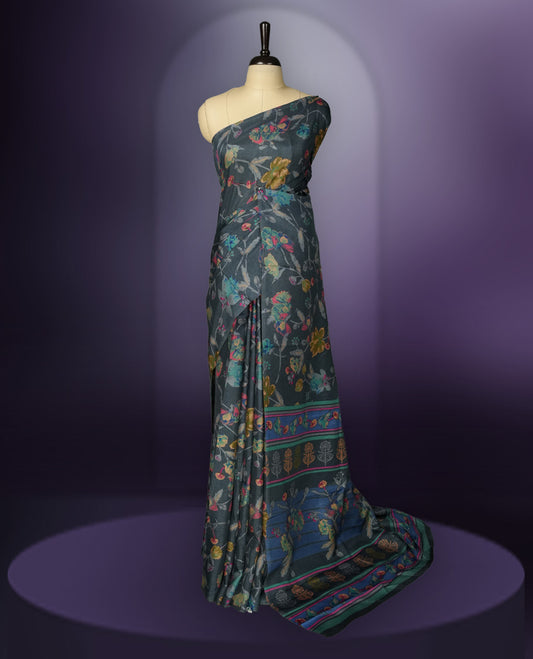 Grey colour saree enhanced with a vibrant multiple colour floral prints on body & pallu, and  comes with a matching blouse.