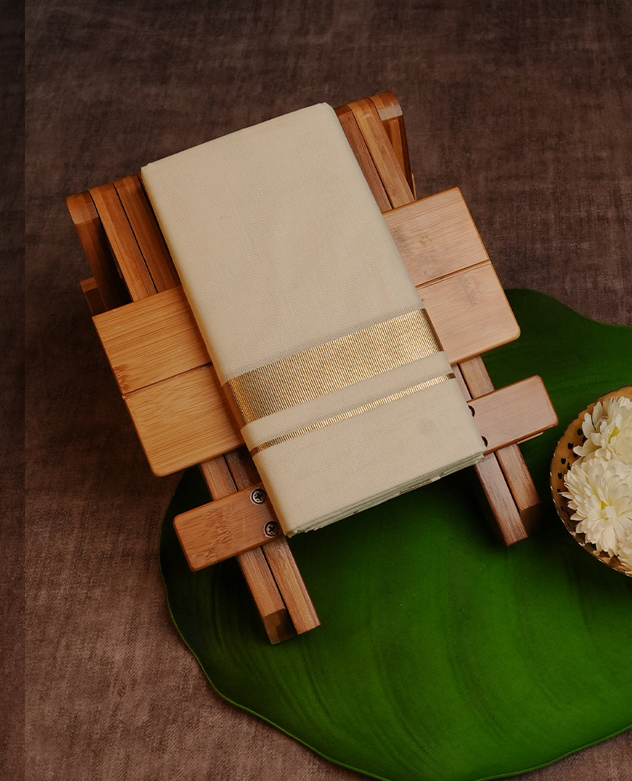 Cream colour Cotton Double dhoti featuring plain with Light  Gold  kara.