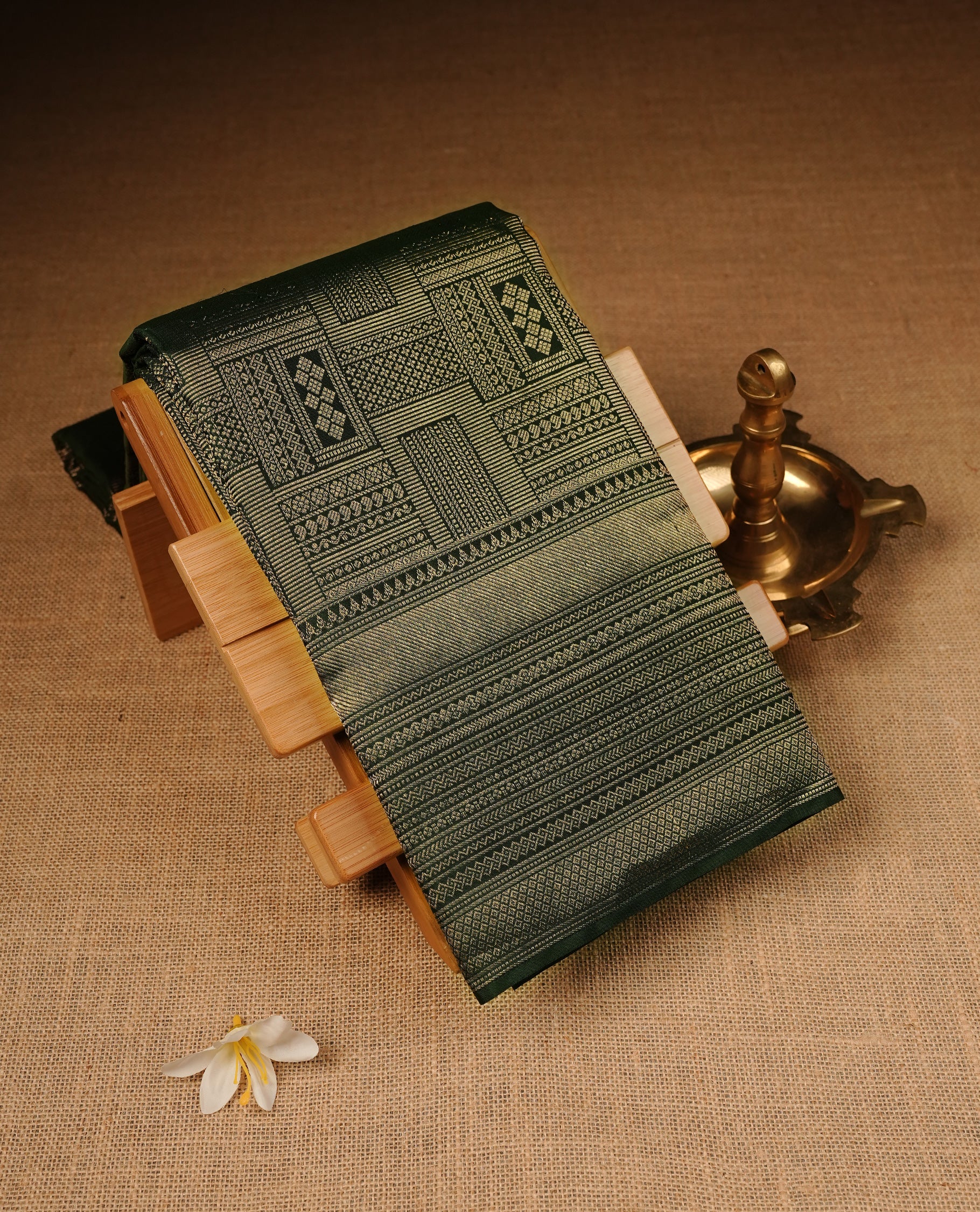 Green Colour Wedding silk saree Featuring Gold Zari Box Pattern on Body, Finished with Self colour With Traditional border, Comes with Matching Blouse Piece.